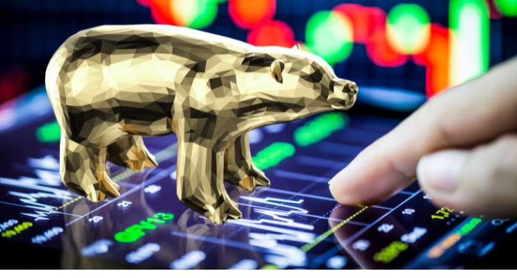 stock market screen with golden bear